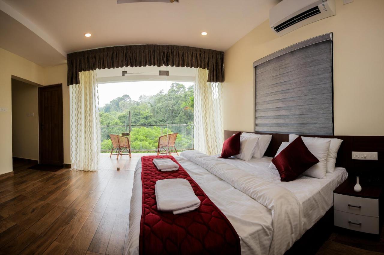 Thenmala Hormuz Inn Kolattupuzha ภายนอก รูปภาพ