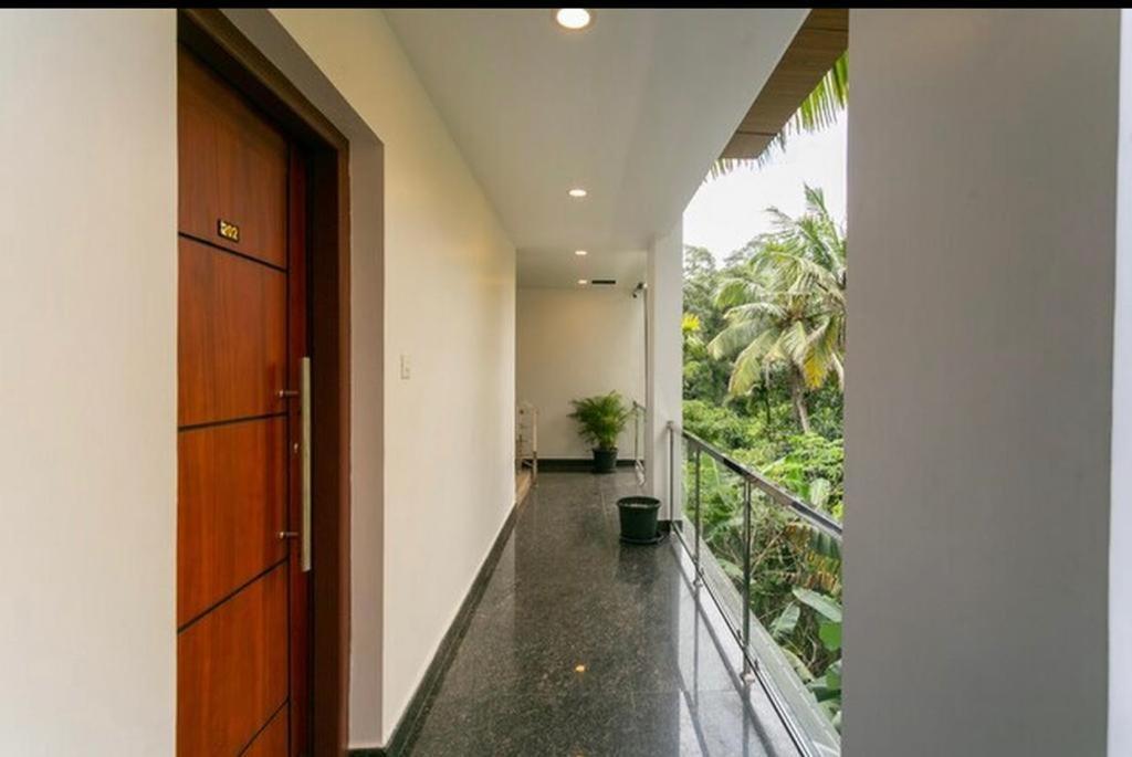 Thenmala Hormuz Inn Kolattupuzha ภายนอก รูปภาพ