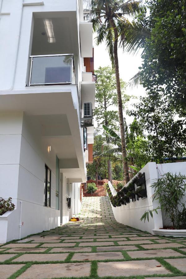 Thenmala Hormuz Inn Kolattupuzha ภายนอก รูปภาพ