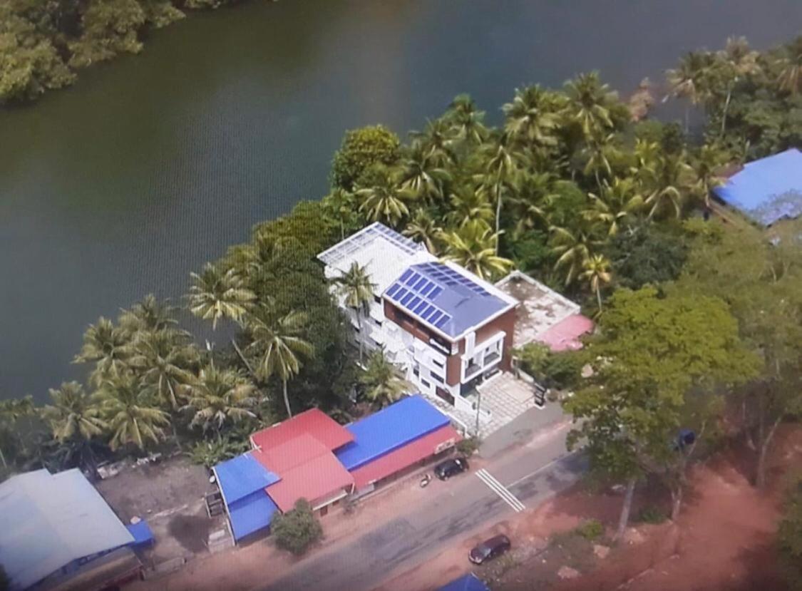 Thenmala Hormuz Inn Kolattupuzha ภายนอก รูปภาพ