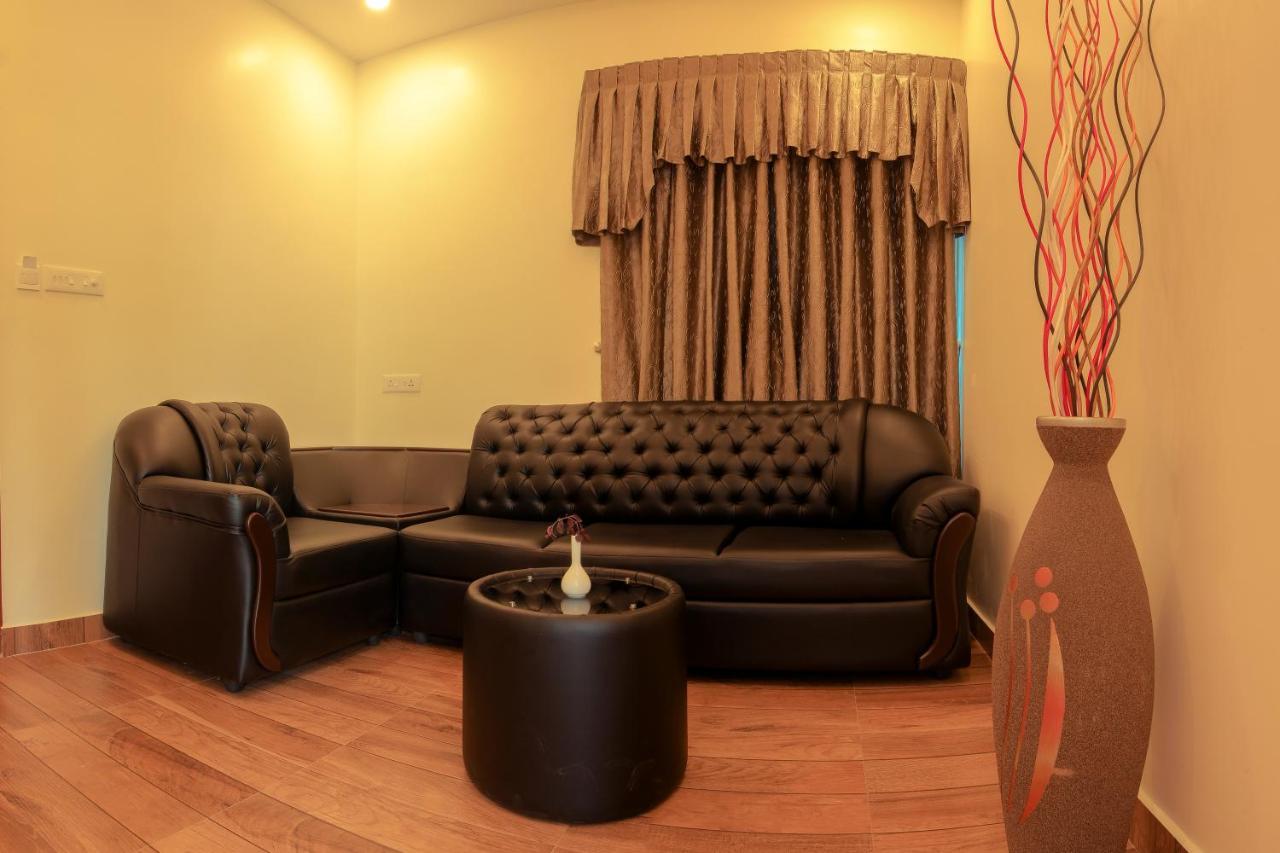 Thenmala Hormuz Inn Kolattupuzha ภายนอก รูปภาพ